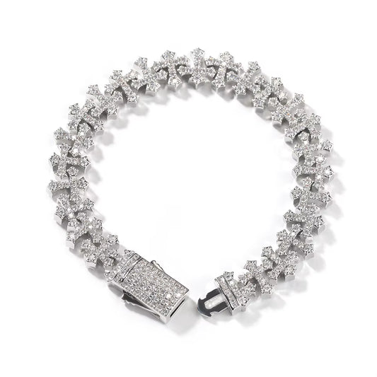 By itself: THE VEIL cross charm bracelet shown in silver