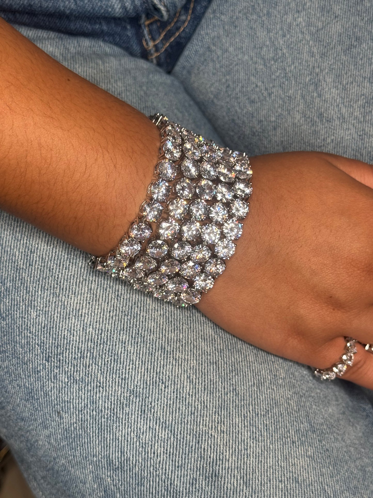 THE AFTER HOURS silver tennis bracelet worn on a wrist