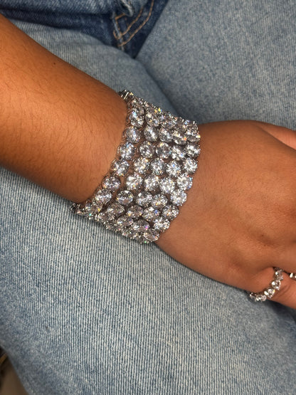 THE AFTER HOURS silver tennis bracelet worn on a wrist